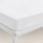 protector de colchón impermeable ajustable blanco barrera anti líquidos