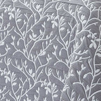 colcha con motivos florales gris reversible