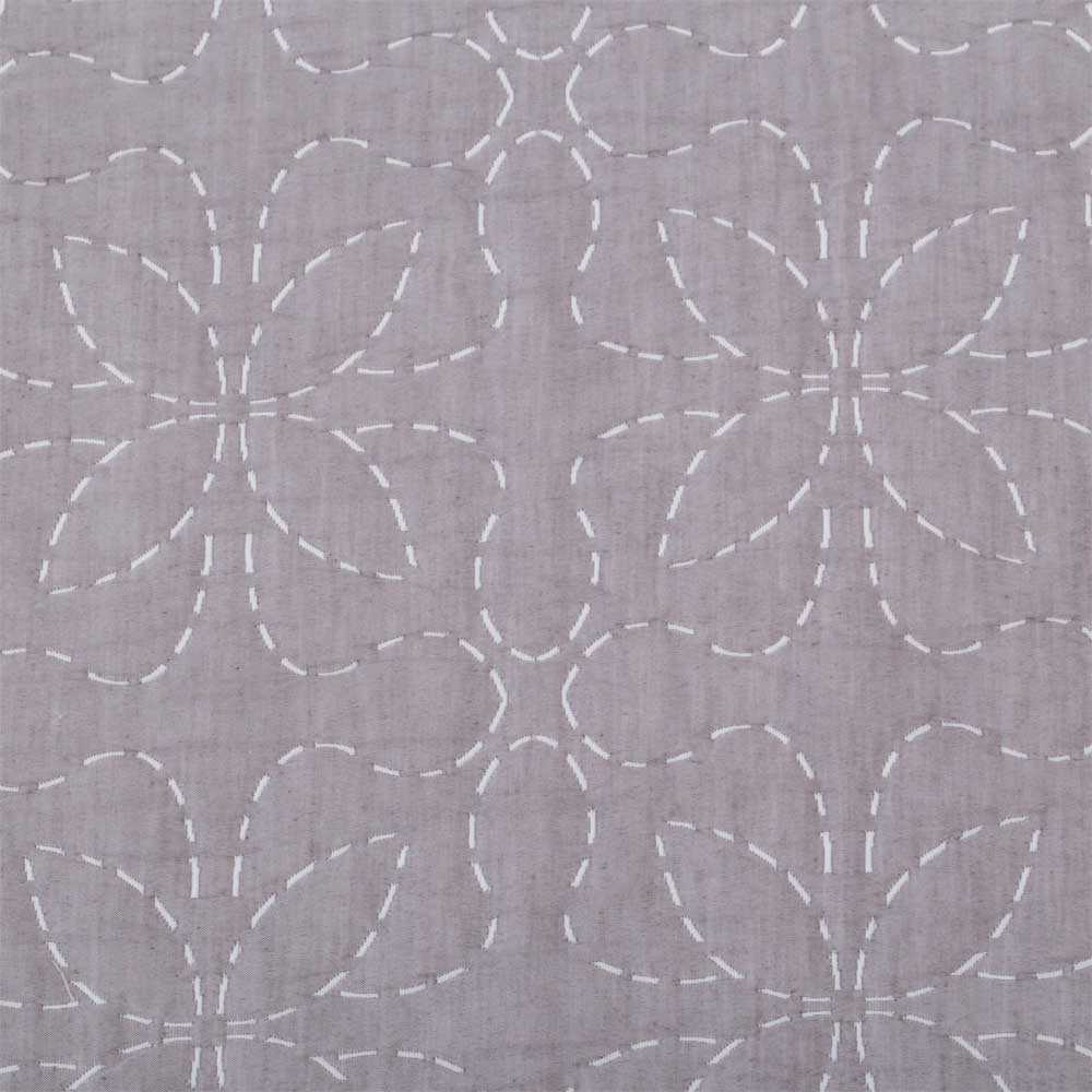 Colcha reversible gris de fácil mantenimiento con acolchado fino y confortable.