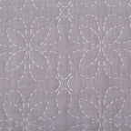 Colcha reversible gris de fácil mantenimiento con acolchado fino y confortable.
