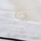 Funda de edredón de satén algodón egipcio blanco para un descanso confortable y fresco.