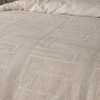 Funda nórdica beige de algodón jacquard prelavado con relieve decorativo y tacto agradable.