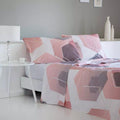 Ropa de cama rosa de poliéster y algodón con tejido transpirable, fácil planchado y textura confortable para todas las estaciones del año.