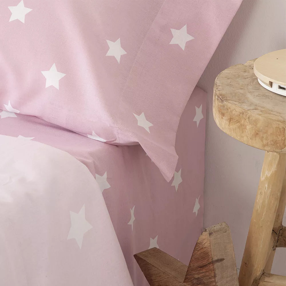 Sábanas infantiles color rosa de algodón-poliéster con tejido agradable al tacto, fácil mantenimiento y diseño delicado para dormitorio infantil.